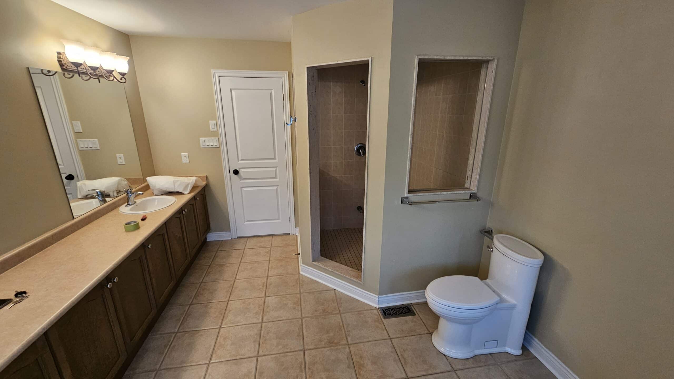 the old corner shower. you can see how dark and small the shower was