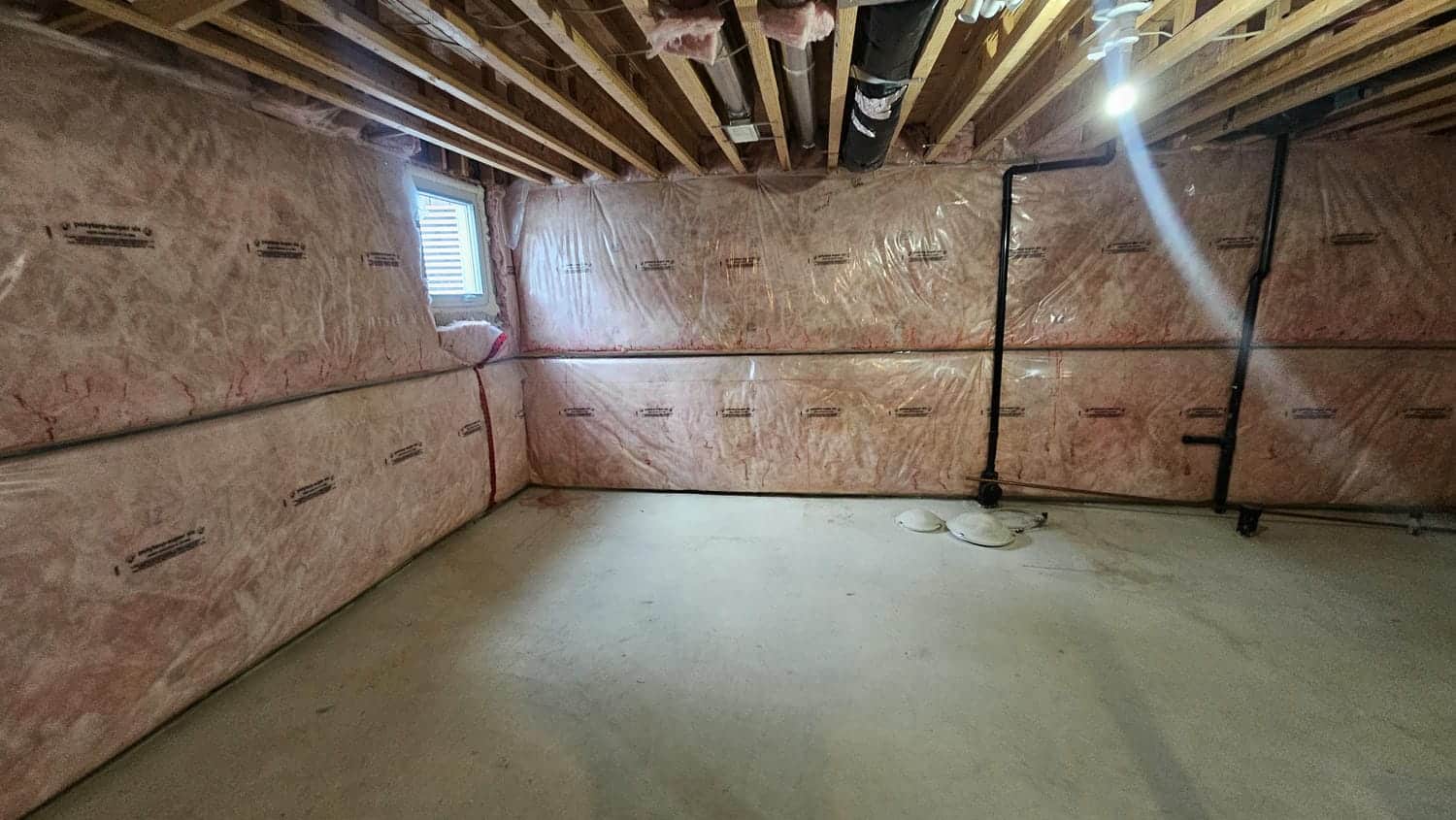 Before the basement renovation with insulation and vapor barrier