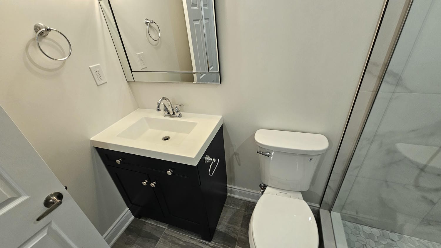higher view of the 3 piece bathroom in this Newmarket basement