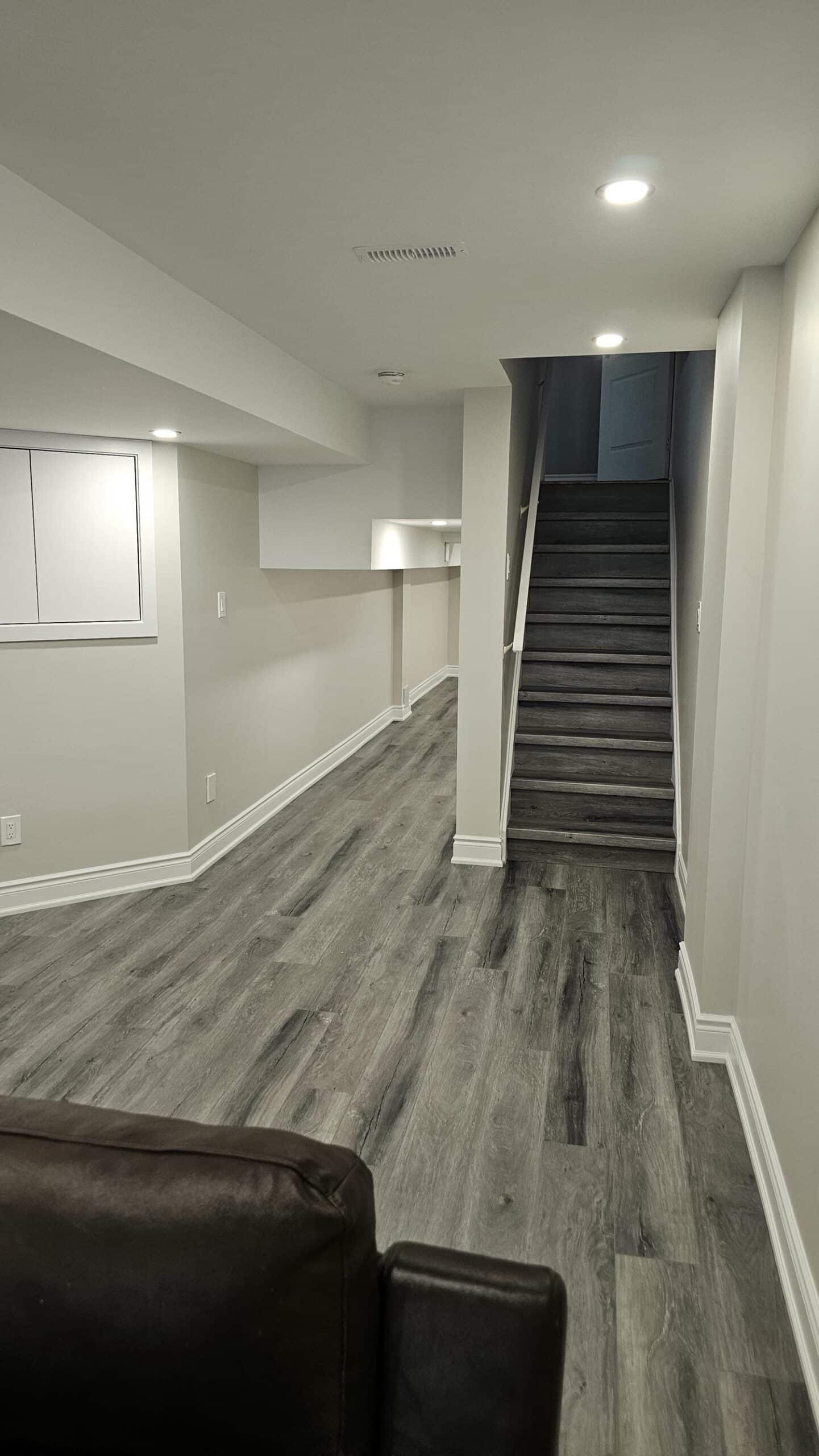 Paint walls with Benjamin Moore paint, 5 inch baseboards and luxury vinyl flooring