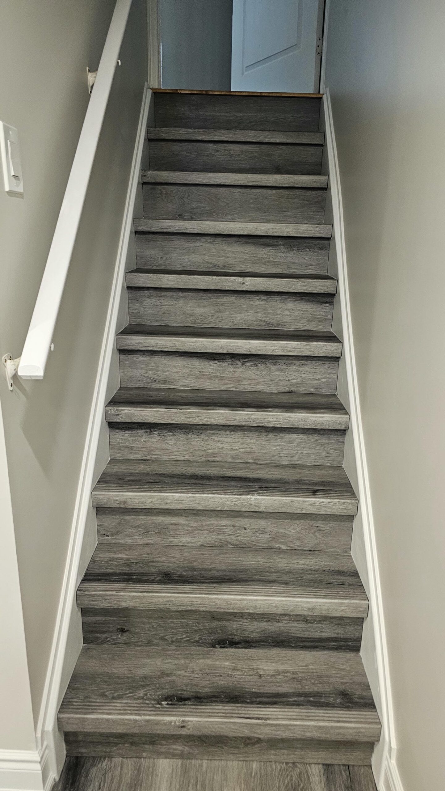Vinyl steps finished to match the flooring in the basement
