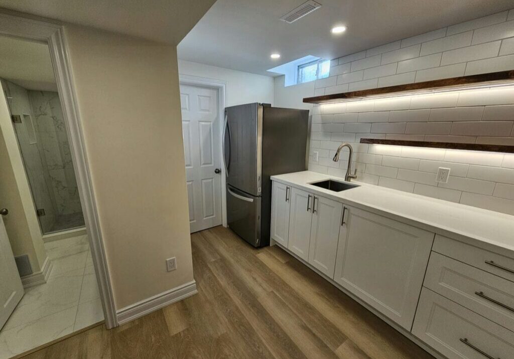 Basement Ikea Kitchen With LED Oak Shelves